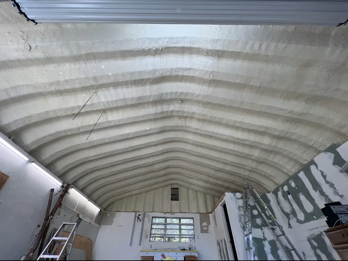 Spray polyurethane foam applied to the underside of a metal roof deck in Tyrone